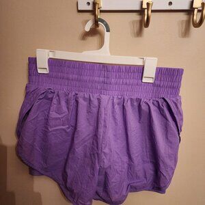 medium target purple/lavender workout or running shorts with built in spandex